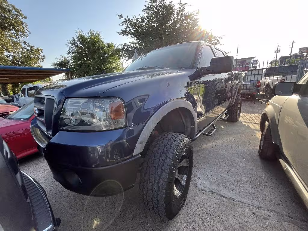 2004 Ford F-150 - 1FTPW14584KC16116 - Image #4