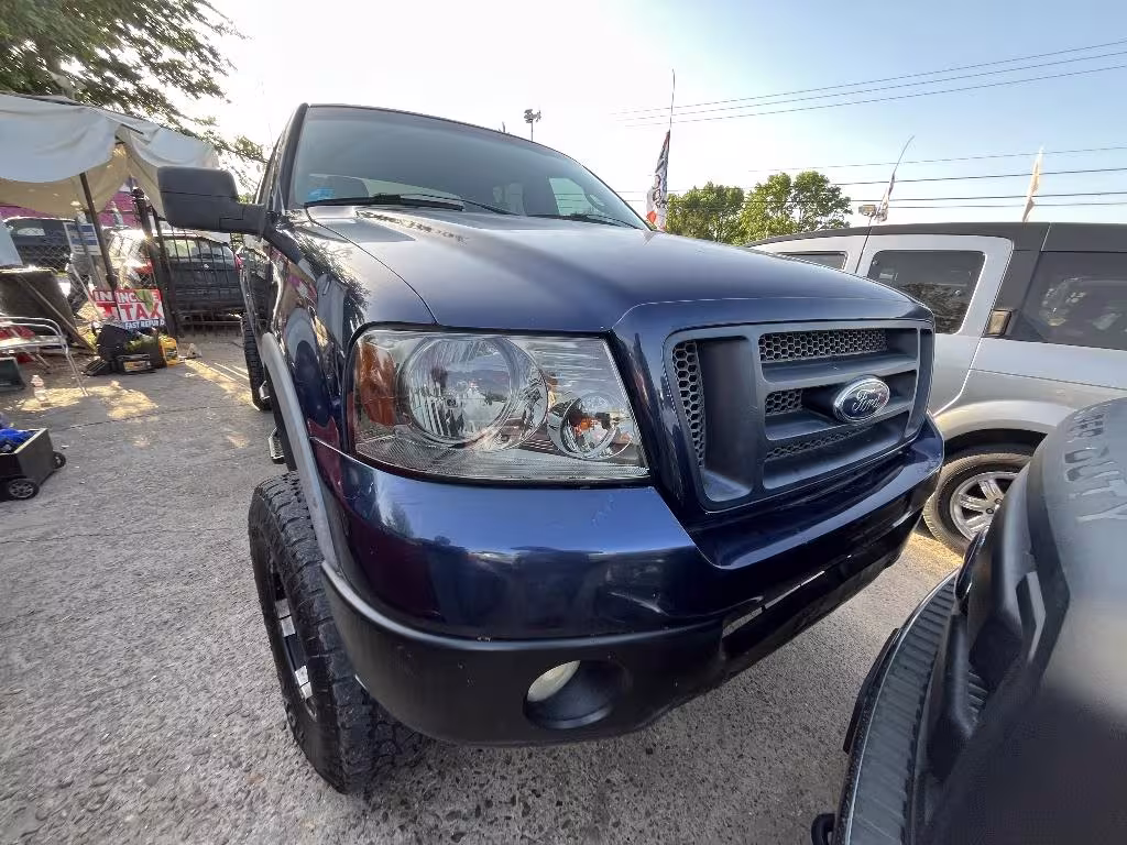 2004 Ford F-150 - 1FTPW14584KC16116 - Image #2